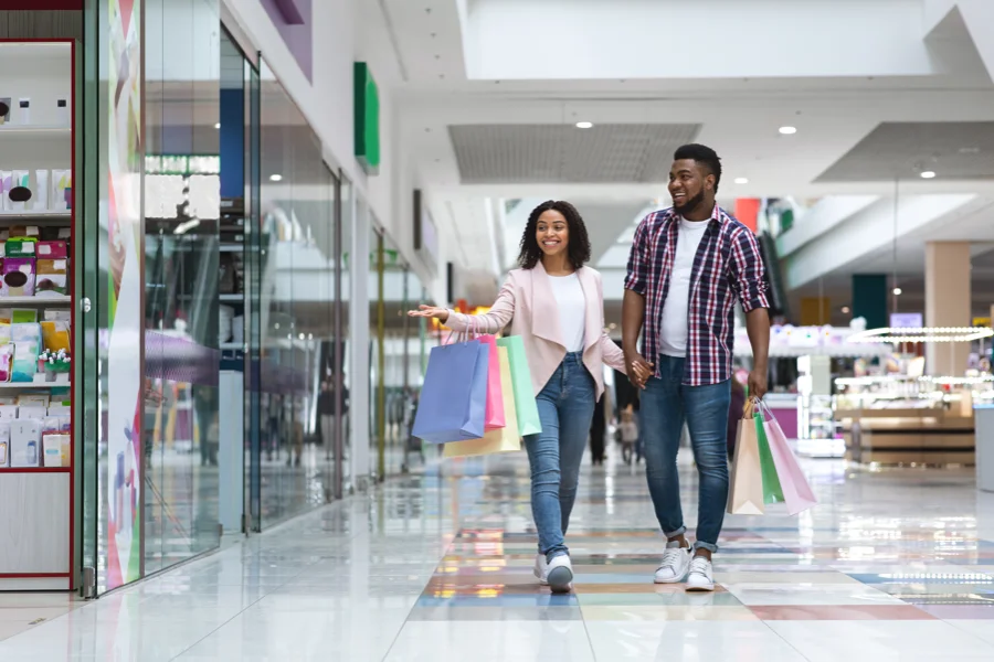 Consumer Markets Image - Mall in Africa with a couple shopping.