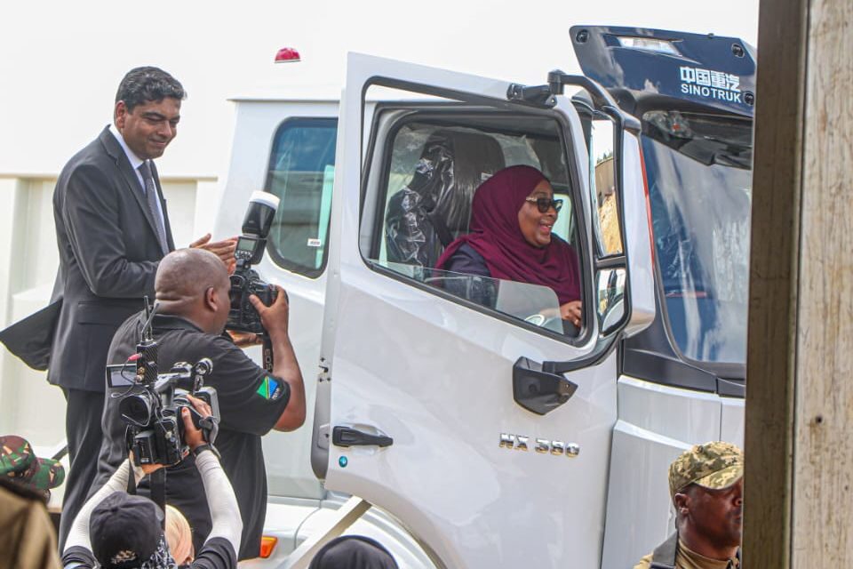 President Samia Suluhu Hassan tries out a lorry assembled at the Saturn Corporation Limited vehicle assembly plant after officially opening the facility in Dar es Salaam